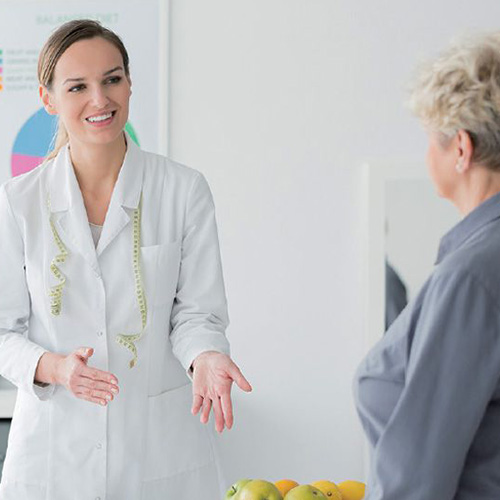 Nutritionist discussing results with patient